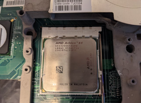 Socket 939 with an Athlon 64 3200+ installed. Photo courtesy of EvieSigma.